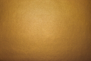Soft gold background texture, subtle textured golden paper