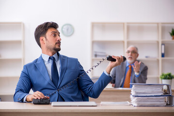 Two colleagues working in the office