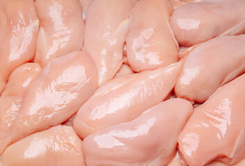 Fresh chicken fillet pieces close-up. Raw fillet.