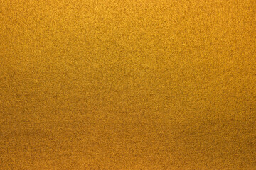 Soft gold background texture, subtle textured golden paper
