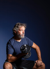 Grey haired man. Senior fitness.