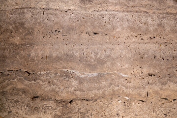 the texture of a stone wall with cracks