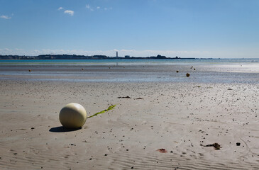 stranded buoy at the beach of St.Helier - Jersey