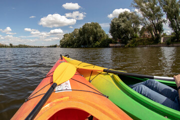 Fototapeta premium Kayak (canoe) hike across the densely thicket river, along the beautiful views of the river