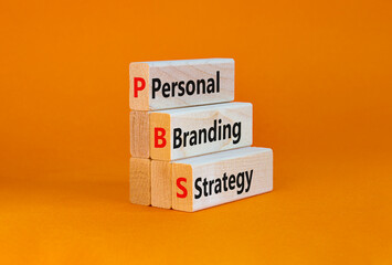 Naklejka premium PBS, Personal branding strategy symbol. Concept words PBS, Personal branding strategy on wooden blocks on a beautiful orange background. Business, PBS, Personal branding strategy concept. Copy space.