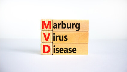 MVD, Masrburg virus disease symbol. Concept words MVD, Masrburg virus disease on wooden blocks on a beautiful white background. Medical, MVD, Masrburg virus disease concept. Copy space.