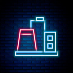 Glowing neon line Factory icon isolated on brick wall background. Industrial building. Colorful outline concept. Vector