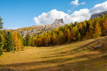 Dolomites, during the day to the Lagazuoi Mountains in the background of the beautiful Pelmo, Averau and Lastoi de Formin mountain peaks, near the town of Cortina d'Ampezzo, in the province of Veneto