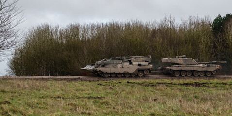 British Army Challenger Armored Repair and Recovery Vehicle (CRARRV) towing a Challenger 2 FV4034...