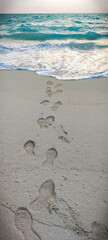 footprints on the beach
Walk into the sea