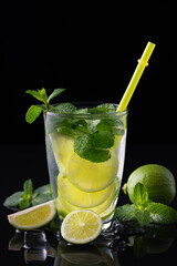 Refreshing summer alcoholic cocktail mojito with ice, fresh mint and lime