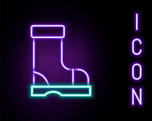 Glowing neon line Waterproof rubber boot icon isolated on black background. Gumboots for rainy weather, fishing, gardening. Colorful outline concept. Vector