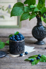 fresh blueberries with green leaves