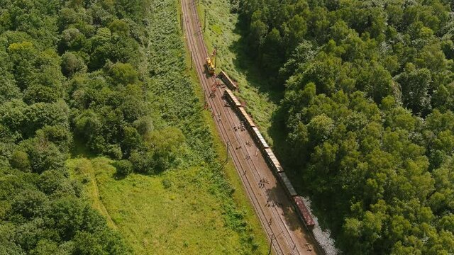 Arial view. Freight train accident, transport derailment, damaged of train