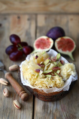 Cheese tet de moine with figs and pistachios.