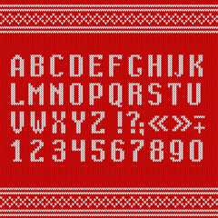 alphabet and numbers on red knitted background. Decorative Christmas poster - 458146354