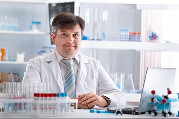 Medical Research in Laboratory: Portrait of a Male Scientist Using Computer to Analyse Data. Advanced Scientific Lab for Medicine, Biotechnology, Microbiology Development