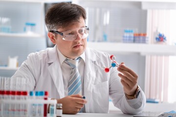 Modern Medical Research Laboratory, Scientists Working Together Analysing Chemicals