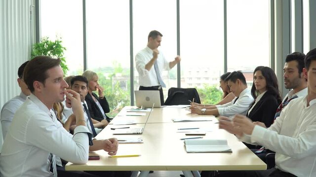 funny senior manager dancing . Group of diverse business People Meeting Conference in office . marketing team Brainstorming Teamwork together at workspace. coworkers Financial . leader boss humorous