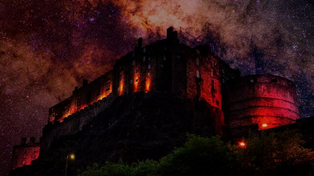 edinburgh castle scotland against a purple red and orange milky way with shooting 
