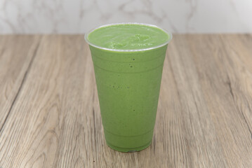 Vegetable leafy greens smoothie cold drink beverage with blended flavors to increase your immunity and better nutrition