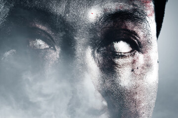 Fototapeta premium Scary zombie with blood and wound on his face