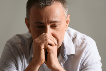 Depressed mature man at home