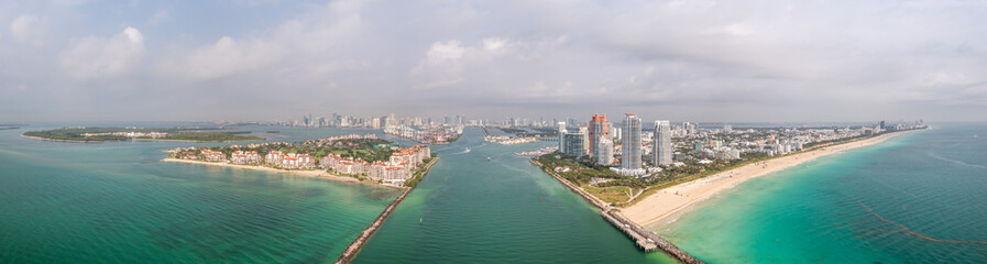 Beautiful aerial panorama over the Government Cut shipping channel looking towards Miami with...