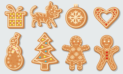Christmas gingerbread cookies in the shape of Christmas ball, Christmas tree, tiger, heart, snowman, gift and gingerbread men.  Sweet homemade glazed biscuits.