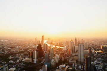 Landscape of the city of Bangkok painted by golden light during sunset