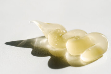 Transparent cosmetic gel on the white background.