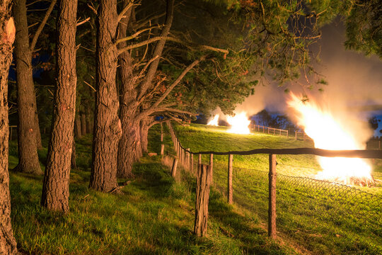 Bonfires in a paddock on a rural property