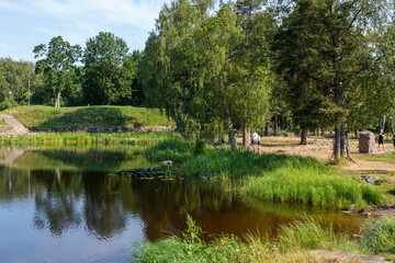 Fototapeta na wymiar Priozersk, Russia - July 10, 2021: Vuoksa river near the museum-fortress 