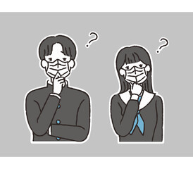 マスクをして困った顔をする男子学生と女子学生
