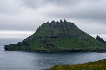 Beautiful aerial view of Drangarnir, the sea stacks between the islet Tindholmur in the Faroe Islands