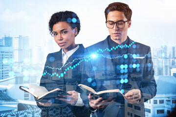 Two colleagues in multinational corporate team working on forecasting trading corporate strategy at...