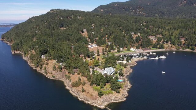 Cinematic 4K aerial drone dolly out footage of Rosario Point, Cascade Bay, East Sound, Rosario Resort and Spa on Orcas Island, San Juan Islands in Washington