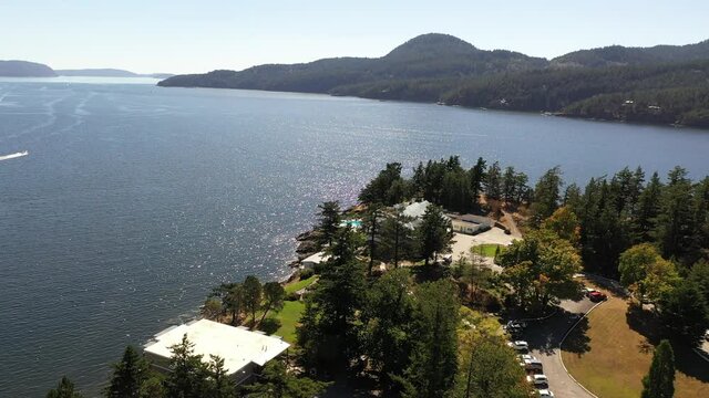 Cinematic 4K aerial drone orbiting footage of Rosario Point, Cascade Bay, East Sound, Rosario Resort and Spa on Orcas Island, San Juan Islands in Washington