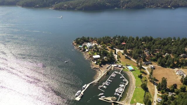 Cinematic 4K aerial drone dolly footage of Rosario Point, Cascade Bay, East Sound, Rosario Resort and Spa on Orcas Island, San Juan Islands in Washington