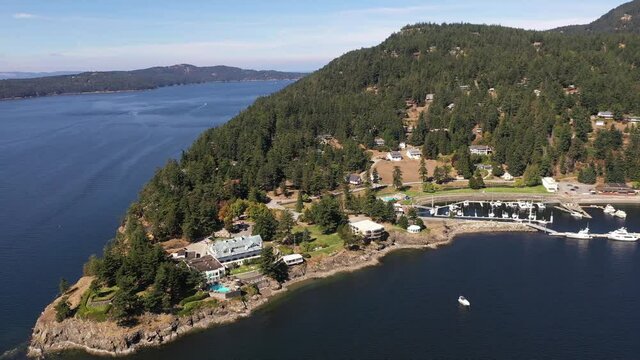 Cinematic 4K aerial drone orbit footage of Rosario Point, Cascade Bay, East Sound, Rosario Resort and Spa on Orcas Island, San Juan Islands in Washington
