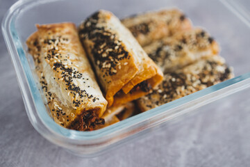 vegan sausage rolls with beans and mixed veggies with seeds topping, healthy plant-based food
