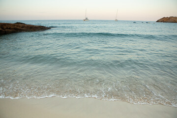 Beautiful beach with very clean and azure water on the mediterranean sea in the island of Ibiza, Spain