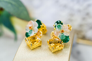 Earrings made of yellow and green sapphire flower shape from skilled craftsmen.