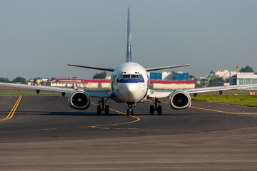 Small passenger jet aircraft taxiing