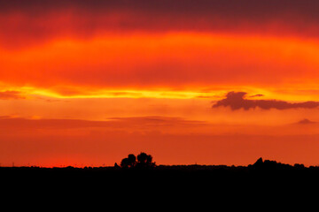 Fiery sunset on a hot summer day