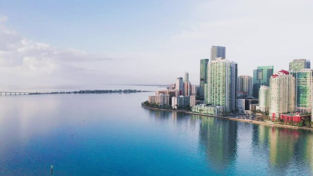 Amazing drone aerial view of Downtown Miami and Brickell Key at dawn, Florida
