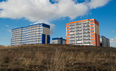 New apartment buildings. New residential area. Housing estate. Modern architecture. Blue sky. Ust-Kamenogorsk (kazakhstan)