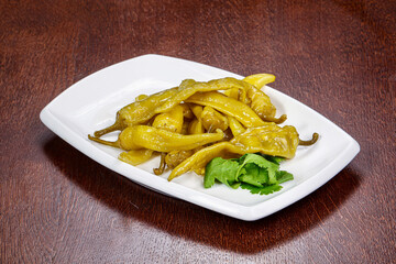 Pickled yellow pepper in the bowl