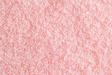 Texture background fabric with pile. Pink soft cloth, macro
