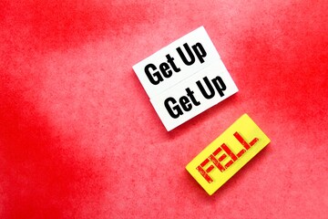 colored board with the words Get up and fell